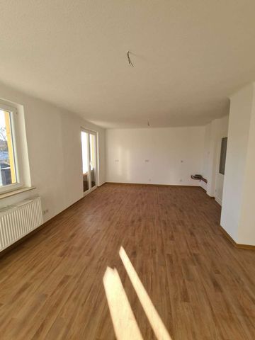 Geräumige Familien-Wohnung mit Garten! - Foto 3