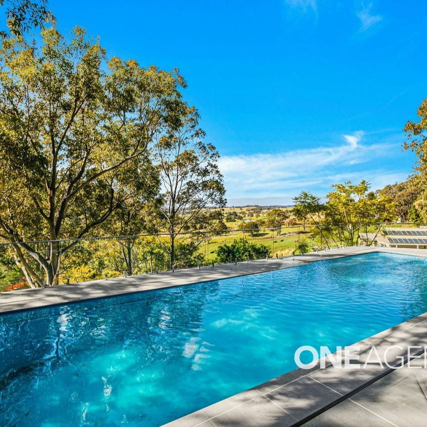 SPACIOUS FIVE-BEDROOM HOME WITH QUALITY INCLUSIONS - Photo 1