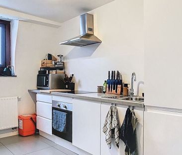 Appartement te huur in Watermaal-Bosvoorde voor € 797 met 1 slaapkamer - Photo 1