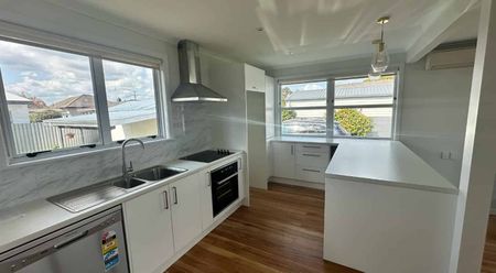 Charming Three-Bedroom Home with Single Garage - Photo 2