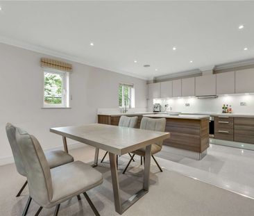 A beautifully presented executive first-floor apartment offering sp... - Photo 5