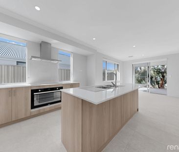 Modern Family Living in Sought-After Rosehill Waters - Photo 4
