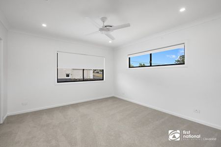 BRAND NEW EXQUISITE EXECUTIVE RESIDENCE - LUXURIOUS LIVING WITH CITY VIEWS + POOL + SOLAR - Photo 4