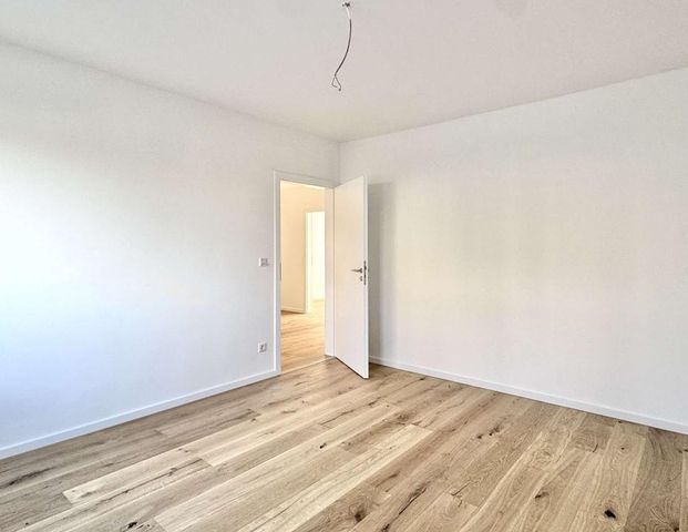 Erstbezug nach Kernsanierung - Energieeffiziente Wohnung mit EBK und Balkon - Photo 1