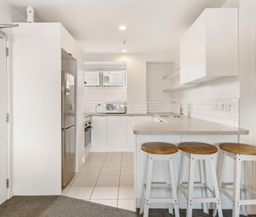 Perfectly Located Apartment with Carpark - Photo 1