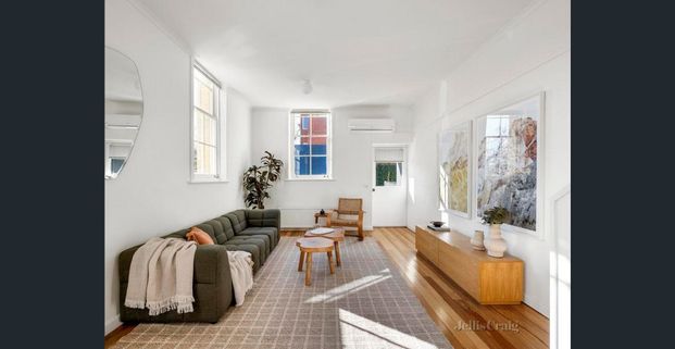 Stunning Heritage Conversion with Expansive Courtyard and Parking - Photo 1