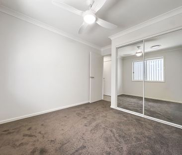 Brand New Duplex Style Family Home - Photo 1