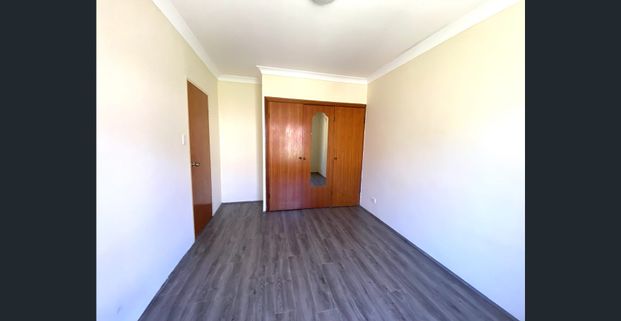 Two Bedroom on the second floor. Floating floorboards throughout. Walk to Station & School & shops - Photo 1