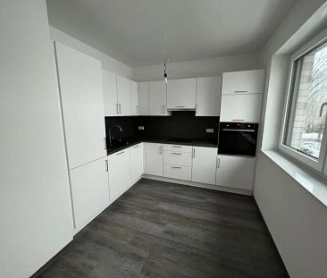 Charmante 2 Zimmer Dachgeschosswohnung inkl. Einbauküche. - Photo 1