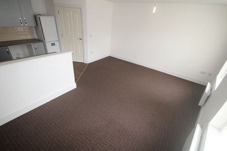 ****Available NOW*** PROPERTY OPTIONS are pleased to offer a first floor one bedroom flat ideally located to the city centre Large open plan lounge/kitchen Lounge having electric heaters. Kitchen with breakfast bar, electric oven, hob and extractor fan, and fridge included in the flat. - Photo 4