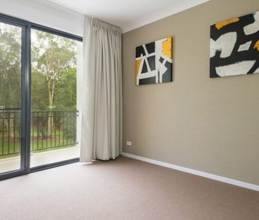 Spacious 4-Bedroom Townhome- Available Soon - Photo 1