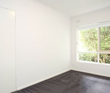 SECURE ONE-BEDROOM APARTMENT WITH PRIVATE COURTYARD & PARKING! - Photo 1