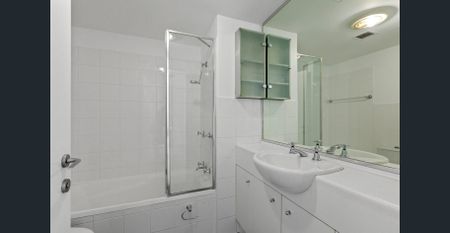 Rare Find - Bright, Oversized One-Bed with Two Balconies + Skyline Views - Photo 4