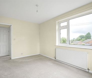 A four bedroom detached family home with driveway parking and garde... - Photo 1