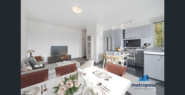 SECURE & STYLISH ONE-BEDROOM APARTMENT - Photo 1