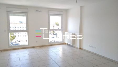 Location Appartement 1 pièce 34m² NIMES 30000 - Photo 3