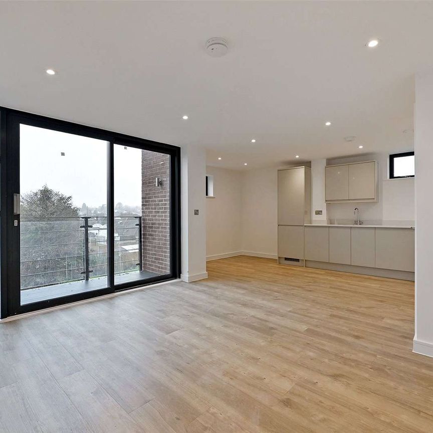 Modern newly built three bed apartment with off-street parking offering light, modern interiors in a sought after location. - Photo 1