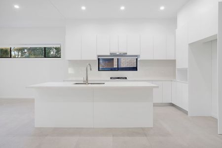 Near new, spacious four bedroom duplex backing onto a reserve - Photo 5