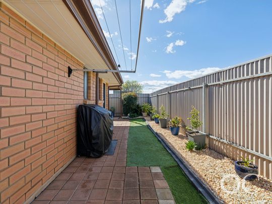 Open the Door to Easy-Care Living with Modern Comfort - Photo 1
