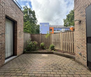 Gelijkvloers appartement met 1 slaapkamer, terras en garagebox - Photo 6