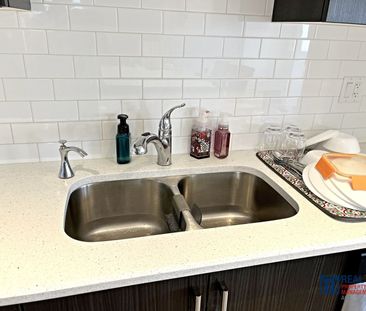 10799 Cityscape Drive NE | Townhouse | 3-bedroom, 2.5-bathroom | Do... - Photo 1