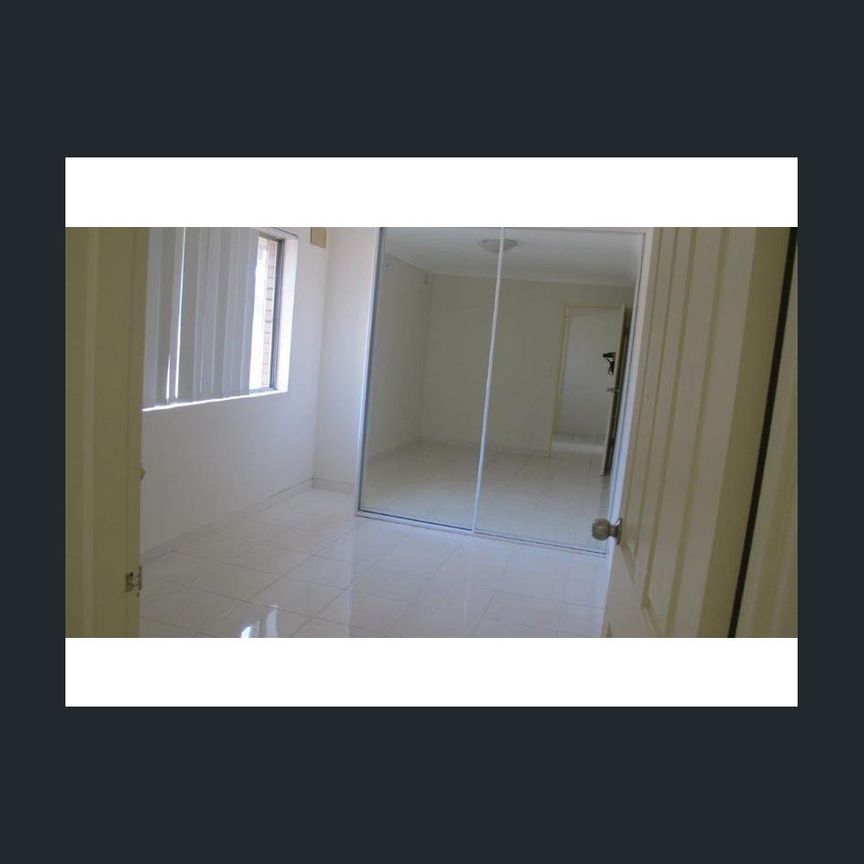 Spacious top floor Unit - Photo 1