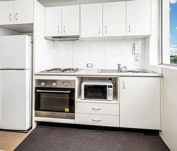 TOP FLOOR NICELY FURNISHED STUDIO WITH A CAR SPACE - Photo 3