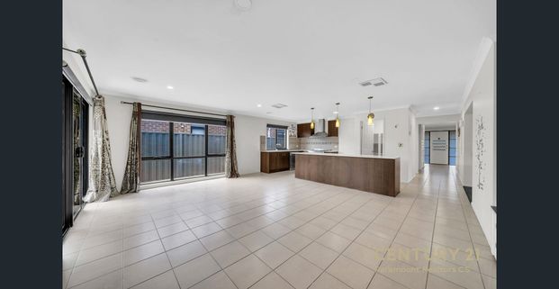 Modern Family Home with Premium Upgrades in a Prime Wyndham Vale Location - Photo 1