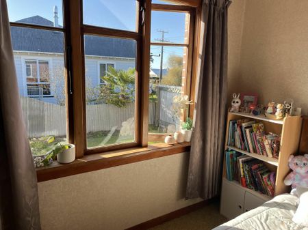 Modern Family Living with a Fully Fenced Backyard - Photo 5