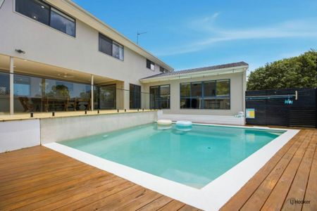 Partially Furnished Luxury Family Home with Pool & Dual-Living Potential - Photo 5