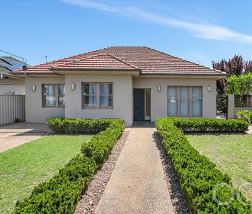 Open the Door to Style, Security, and Location in Woodville South - Photo 2