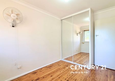 Charming 3-Bedroom Home with Spacious Backyard - Photo 2