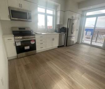 BRAND NEW END UNIT - Stacked Townhouse in Guelph - Photo 3