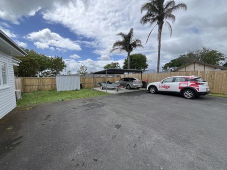 Discover this beautifully renovated three-bedroom, one-bathroom home complete with a second toilet for added convenience. - Photo 3