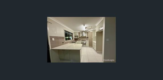 Generous family home with large sheds and ample space close to Caboolture CBD - Photo 2