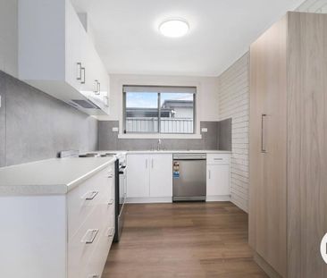 EASY CARE UNIT IN PRIME EAST ALBURY LOCATION! - Photo 4