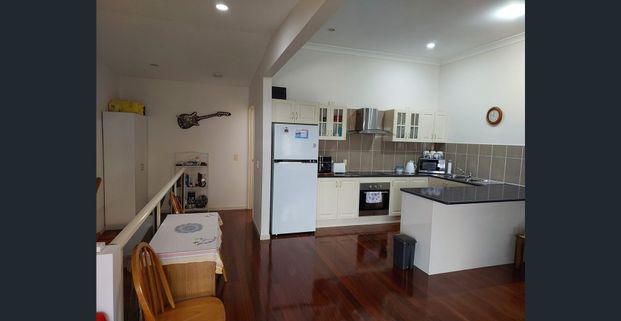 STYLISH TOWNHOUSE IN GREAT LOCATION - Photo 1