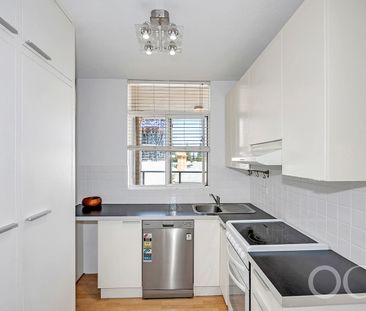 Open the Door to Beachfront Living with Stunning Sea Views - Photo 6