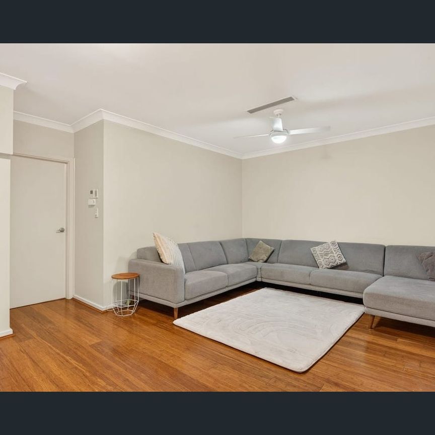 Modern Family Living with Space and Convenience - Photo 1