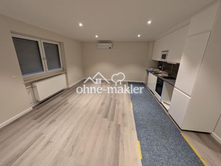 Erstbezug! Stilvolle 3-Zi KfW Neubauwohnung in Toplage von Rüdesheim mit Aufzug - Photo 2