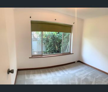 Charming 3-Bedroom Unit in City-Fringe Location - Photo 1