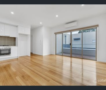 Comfortable & Convenient Townhouse Living - Photo 1