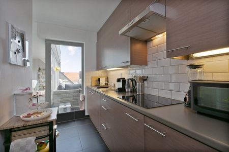 Dakappartement met ruim zuidgeoriënteerd terras! - Photo 2