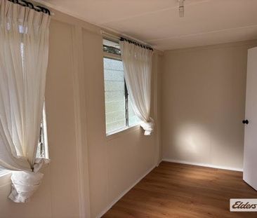 Long-Term 2-Bedroom Rental with Secure Fenced Yard - Photo 4