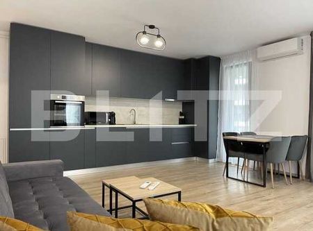 Apartament de 2 camere, modern, 55 mp, garaj, zona Golden Tulip - Fotografie 3