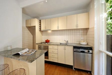 Courtyard Living Close to it All! - Photo 3