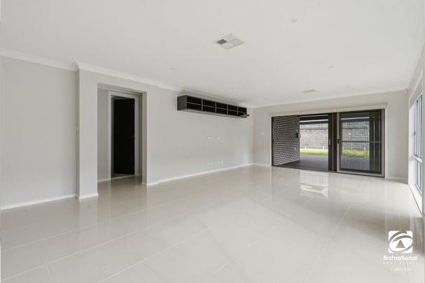 Spacious Family Home with Multiple Living Areas - Photo 1