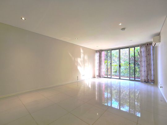 FOOTSTEPS TO TO ALL AMENITIES - MODERN TWO BEDROOM APARTMENT - Photo 1