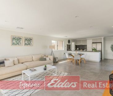 Trendy Coastal Living in Beachside Waikiki - Photo 1