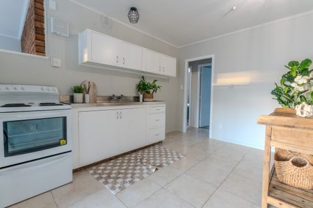 This newly renovated 2-bedroom unit offers modern, low-maintenance living in a prime location near the hospital and close to the CBD. - Photo 3